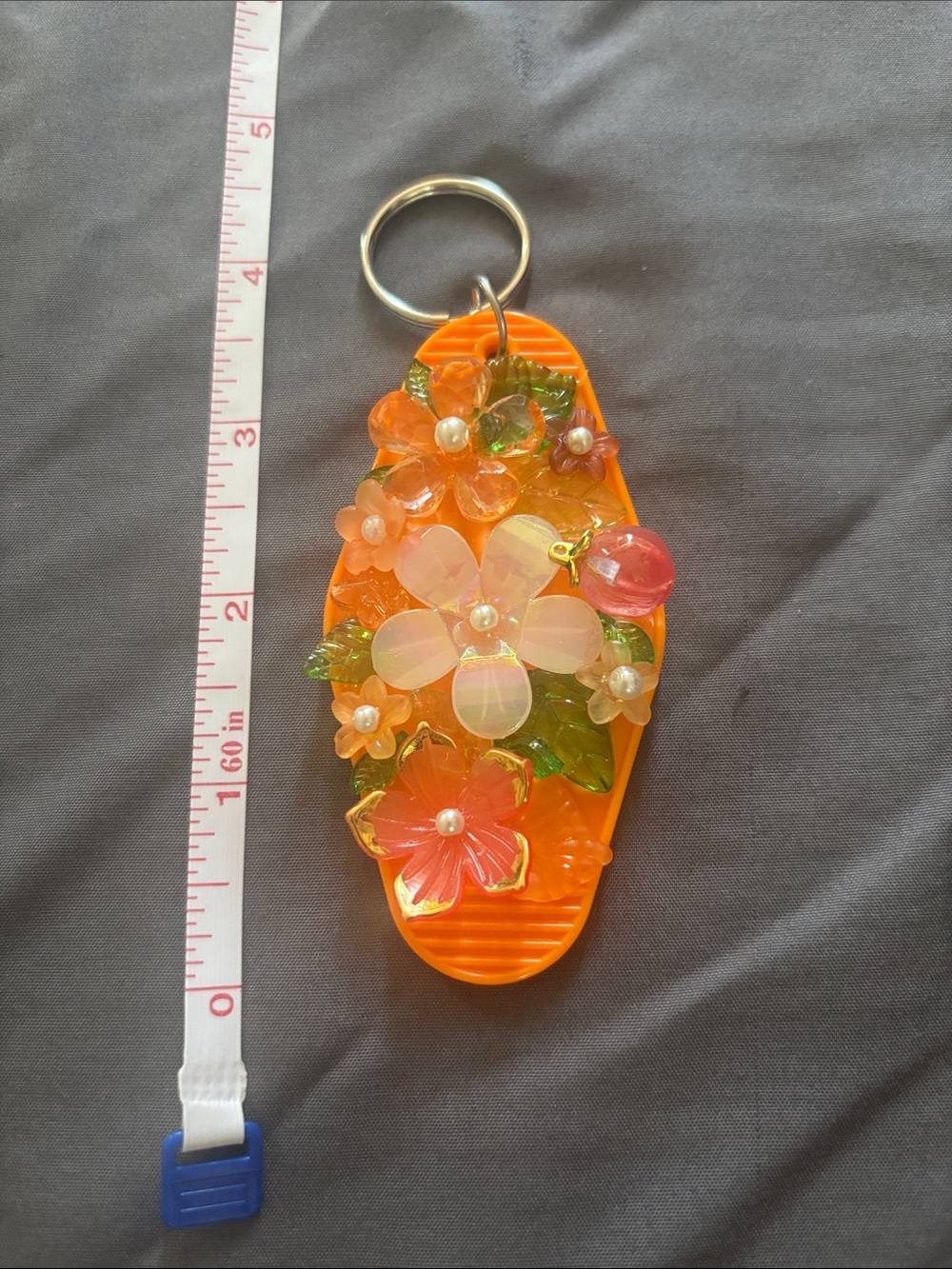 Flower beadazzled orange motel style keychain